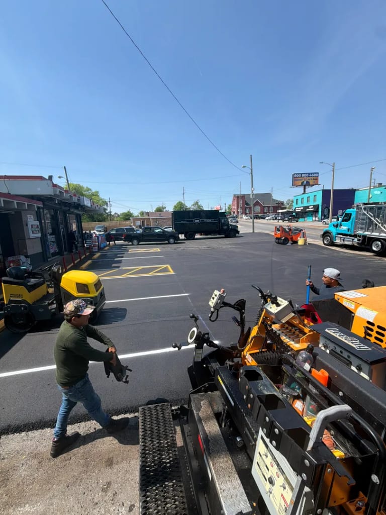 City Roads LLC asphalt paving crew at work