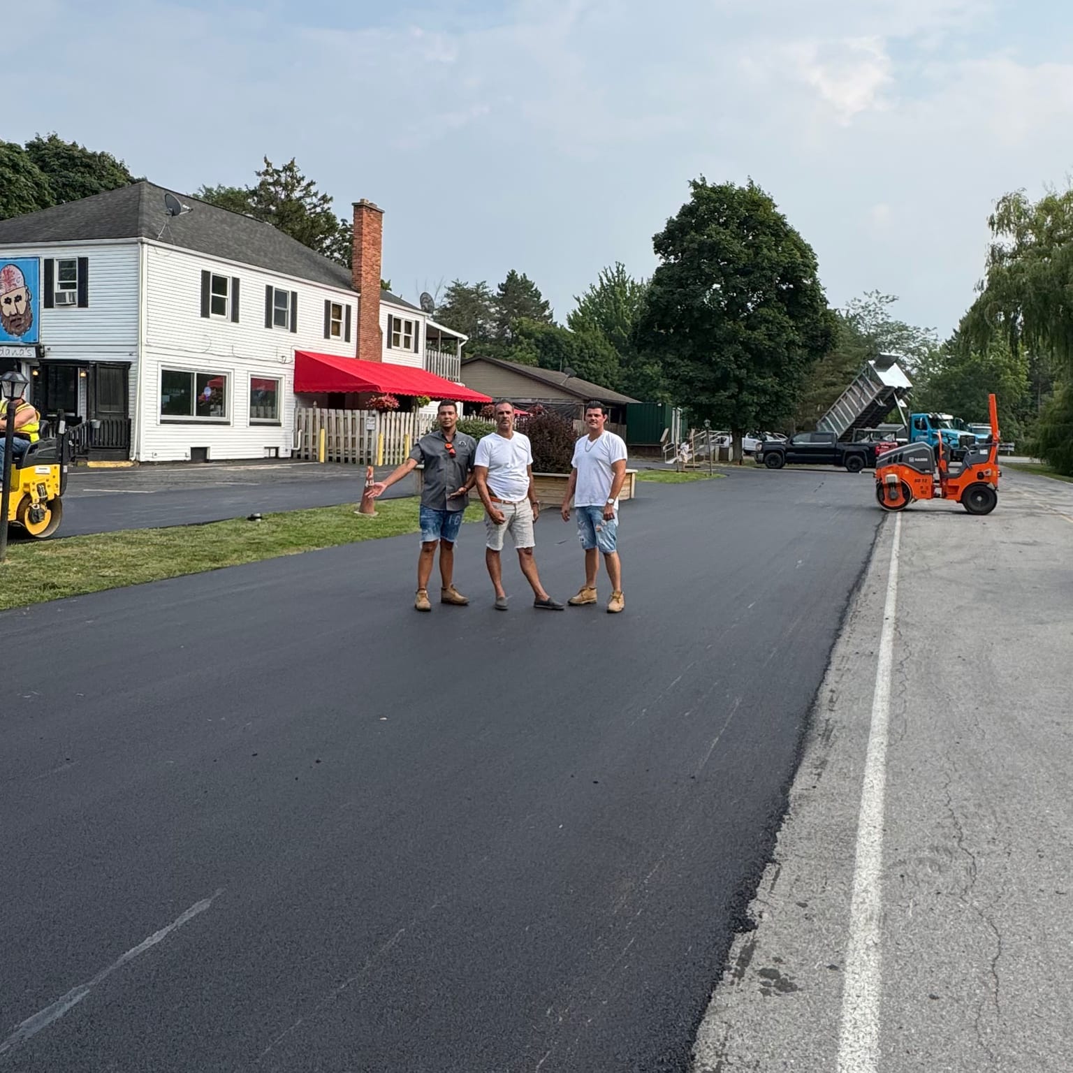 James Young and the City Roads LLC crew on a freshly paved lot
